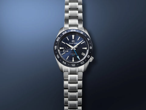 SEIKO SBGE255 Spring Drive GMT Stainless Steel Sapphire Crystal Water Resistant 200m Sport Collection